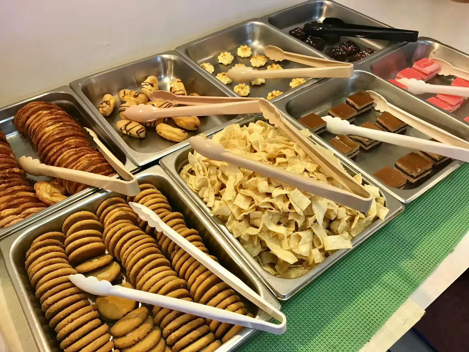 Interior of Buffet restaurant Hong Kong Buffet with Self service dining table for pastry Brownfield